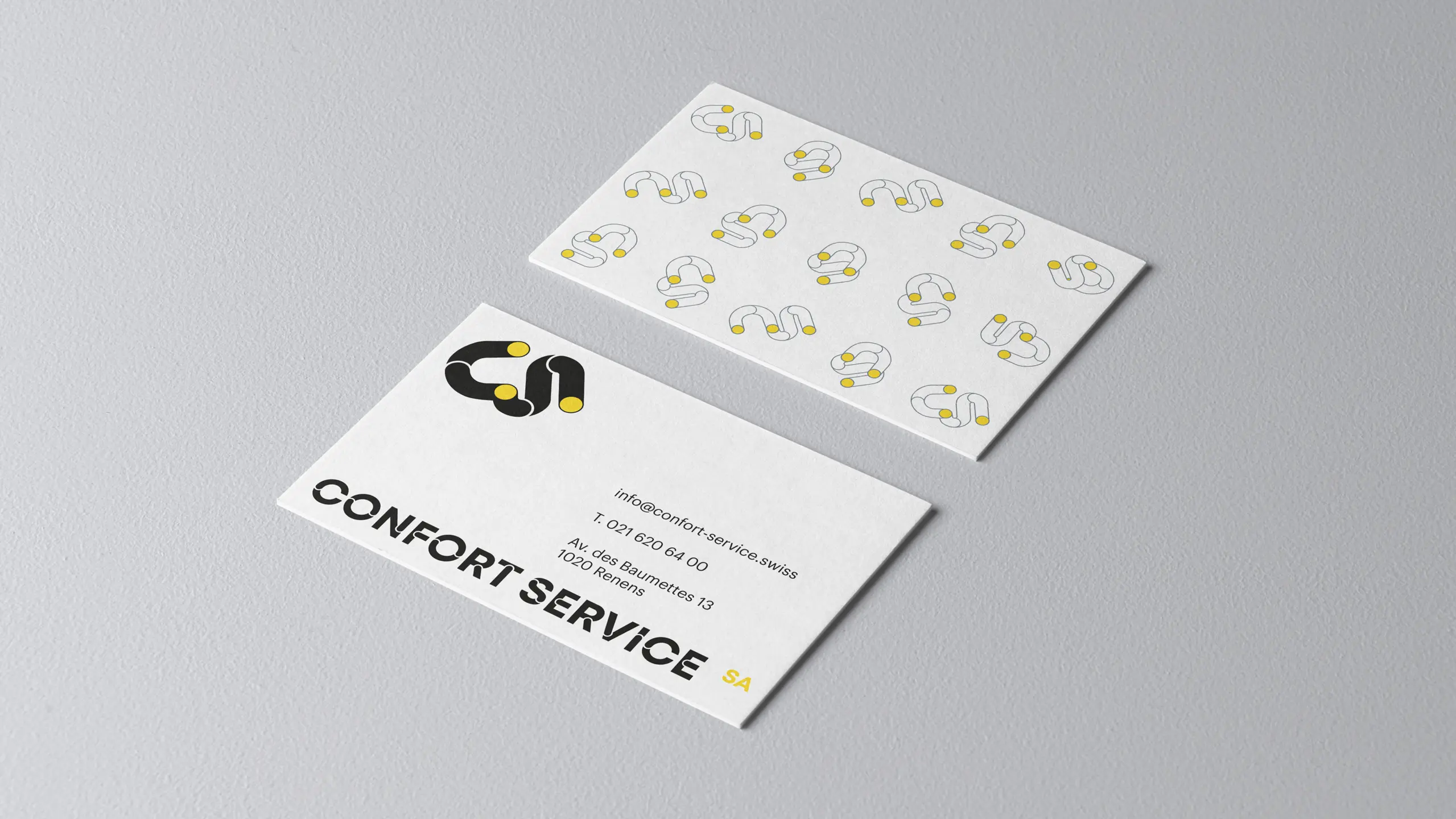 Cartes de visite et motif de marque Cartes de visite Confort Service avec motif de monogrammes CS raccordés au verso