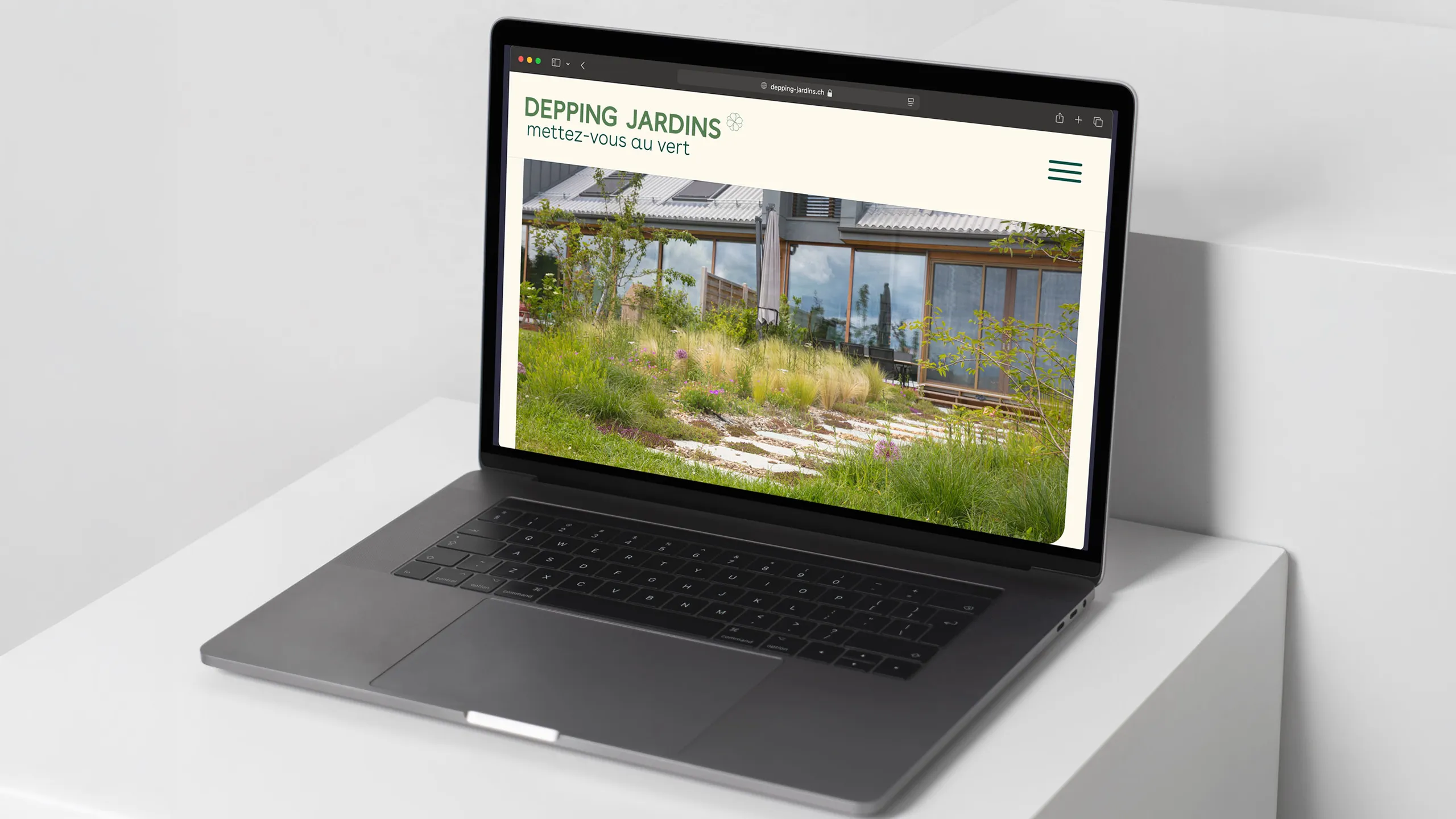 Page d'accueil du site Depping Jardins montrant un aménagement de jardin paysager